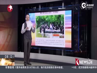 南京官方回应女官员抗涝摆拍：系带病抗洪
